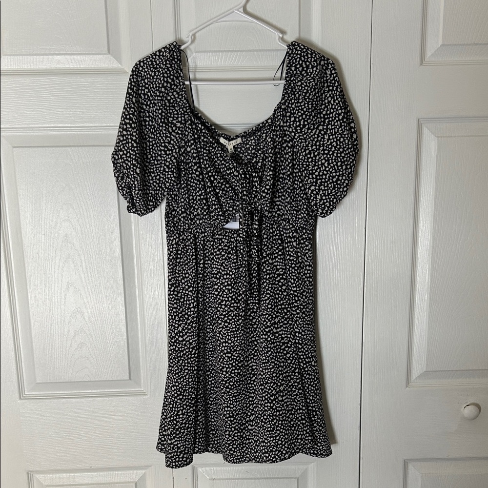 Elegant Black and White Polka Dot Dress